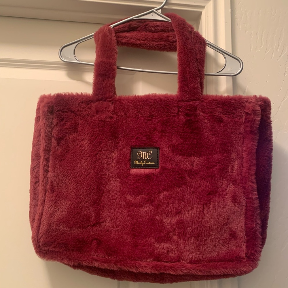 Light plum Minky Couture tote. Brand new, never used. Size large.